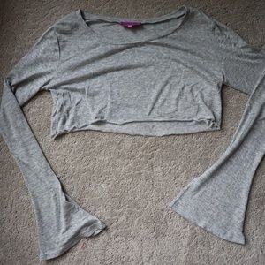 Edikited grey distressed long sleeve shirt.
